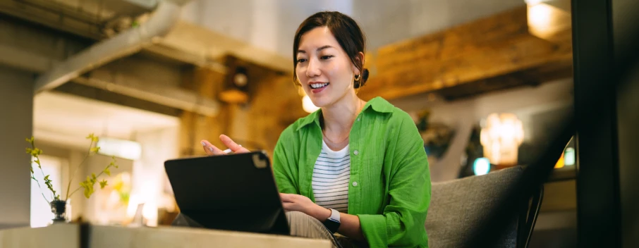 Woman using a tablet at home